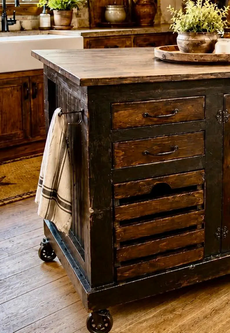 Distressed black Kitchen Island with large crate for storing potatoes or onions